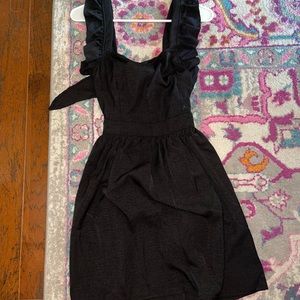 Boutique ruffle tie back mini dress.
